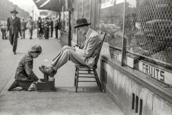 April 1941. "Shoeshine, 47th Street, Chicago's main Negro business street." 35mm negative by Edwin Rosskam for the Resettlement Administration. View full size.
