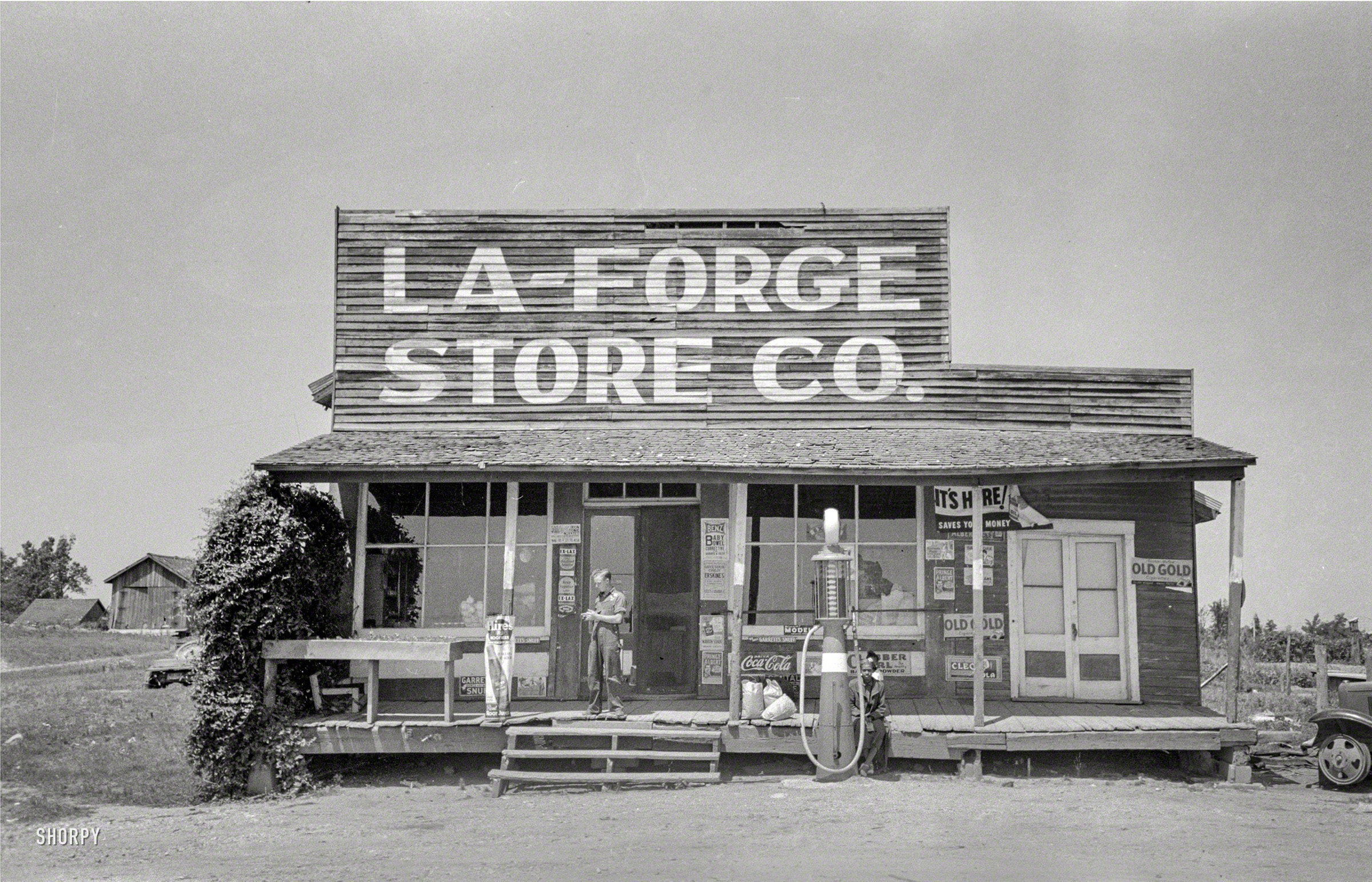 May 1938. "Store, La Forge, Missouri." Your source for Benz Baby Bowel Corrective. 35mm negative by the peripatetic Russell Lee. View full size.
