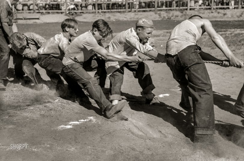 July 1941. "Boys' tug of war, Fourth of July celebration. Vale, Oregon." 35mm acetate negative by Russell Lee for the Farm Security Administration. View full size.
