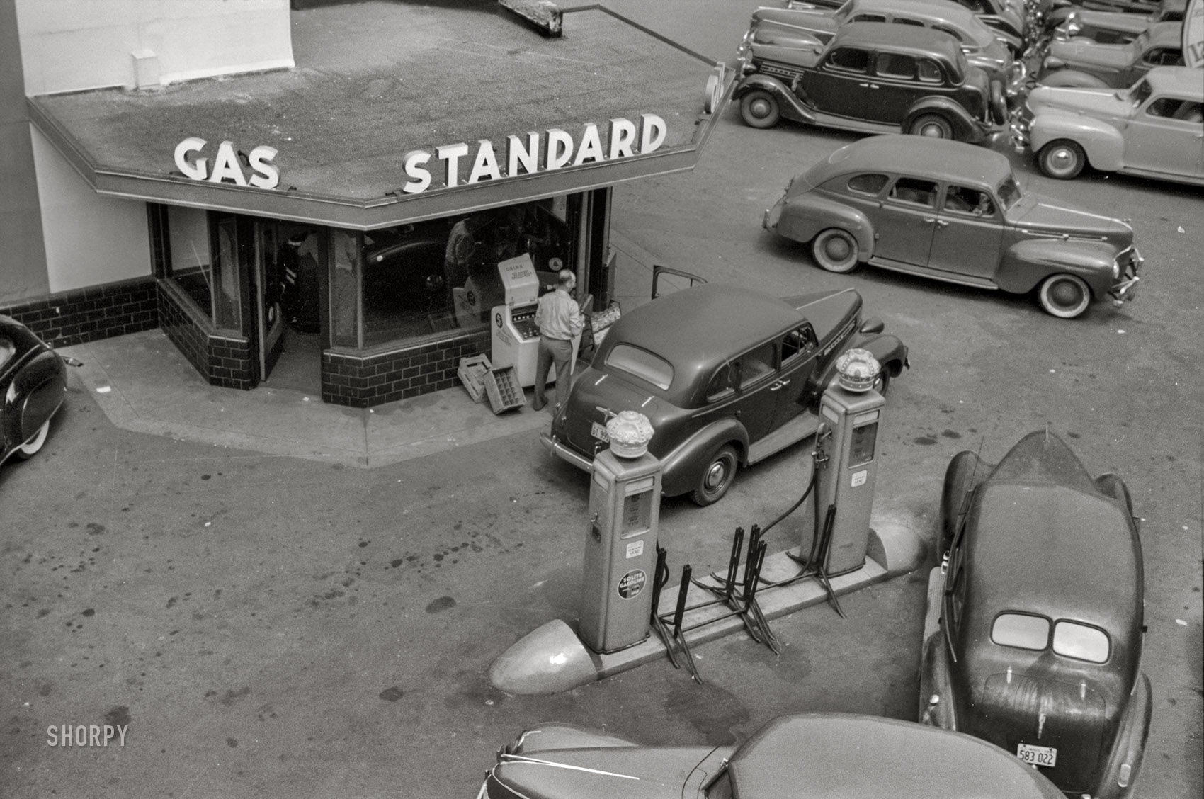 July 1941. "Gas station. Chicago, Illinois." 35mm nitrate negative by John Vachon for the Farm Security Administration. View full size.