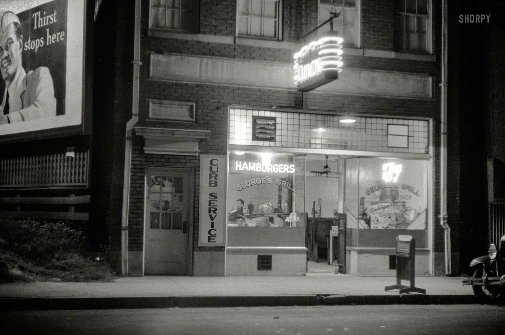 May 1940. "A hamburger shop in Durham, North Carolina." George's Grill, open all night. 35mm nitrate negative by Jack Delano. View full size.