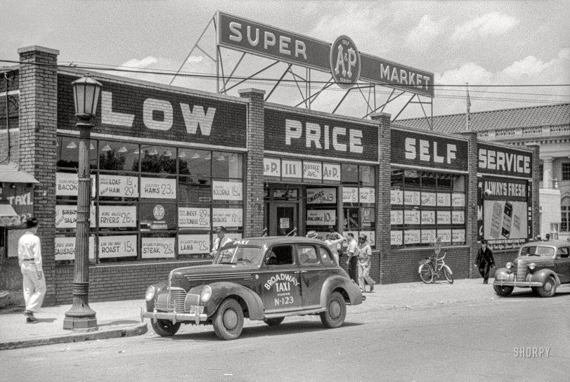 May 1940. "The 'super market' in Durham, North Carolina." Back when self-service groceries were enough of a novelty that photographers put the name for them in quote marks. 35mm nitrate negative by Jack Delano for the Farm Security Administration. View full size.
