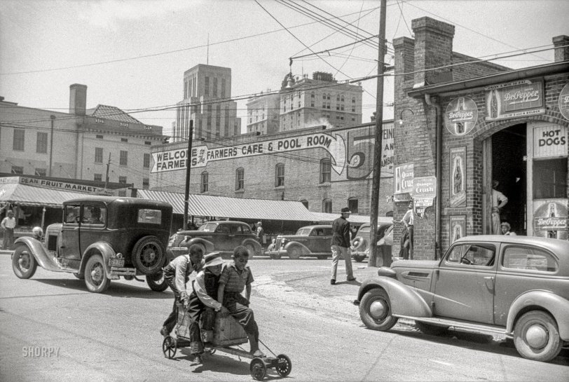 May 1940. "Outside of the tobacco warehouses in Durham, North Carolina." 35mm nitrate negative by Jack Delano for the Farm Security Administration. View full size.
