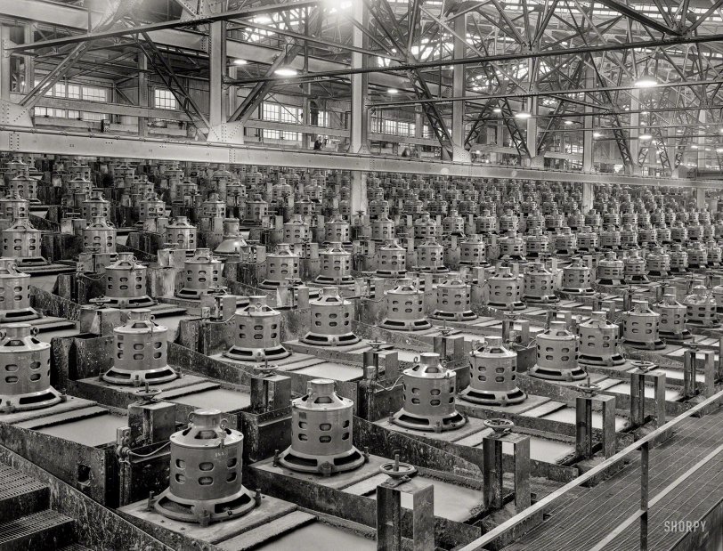 November 1942. "Flotation machines at one of the copper concentrators of the Utah Copper Company. Its plants at Magna and Arthur in Utah are treating vast quantities of the copper so vital for war purposes." Photo by Andreas Feininger for the Office of War Information. View full size.
