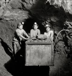 December 1942. "Production. Mercury. Loading mercury ore into a mine car by hand at the New Idria, California, plant of the New Idria Quicksilver Mining Company. Triple-distilled mercury is produced from cinnabar, an ore containing sulfur and mercury mined at a number of workings near the plant." Photo by Andreas Feininger for the Office of War Information. View full size.