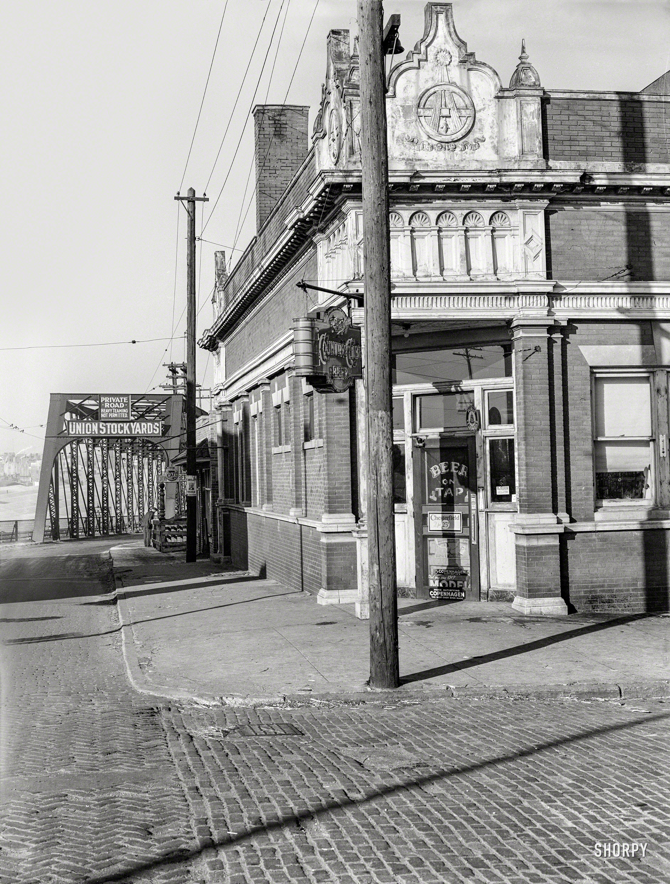 November 1938. "Saloon near entrance to Union Stockyards. South Omaha, Nebraska." Medium format negative by John Vachon. View full size.