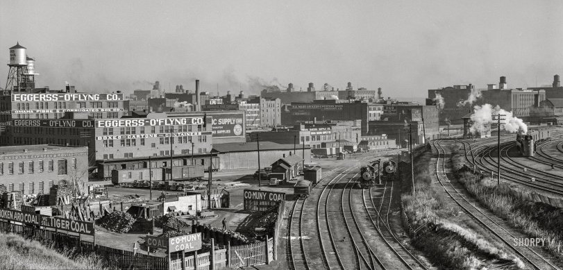 November 1938. "Railroad and coal yard, Omaha, Nebraska." Medium format acetate negative by John Vachon for the Farm Security Administration. View full size.