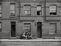 June 1942. Washington, D.C. "Apartment house at 1739 Seaton Road." 4x5 acetate negative by Gordon Parks for the Office of War Information. View full size.