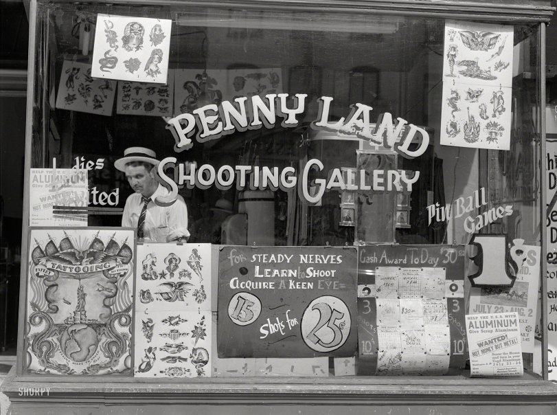 July 1941. "Ninth Street amusements, Washington, D.C." Medium format acetate negative by Martha McMillan Roberts for the FSA. View full size.
