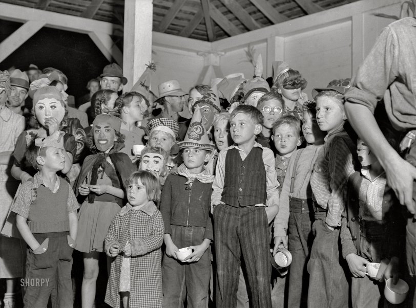 October 1938. "Shafter, Kern County, California. Halloween party at FSA camp for migratory agricultural workers." Acetate negative by Dorothea Lange for the Farm Security Administration, and Happy Halloween from Shorpy. View full size.
