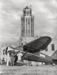 January 1942. Fort Worth, Texas. "Meacham Field. Civilian pilot training school. Instructor and students, control tower in background." Acetate negative by Arthur Rothstein. View full size.