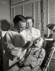 February 1942. "Dental clinic, Farm Security Administration camp, Weslaco, Texas." Photo by Arthur Rothstein, Office of War Information. View full size.