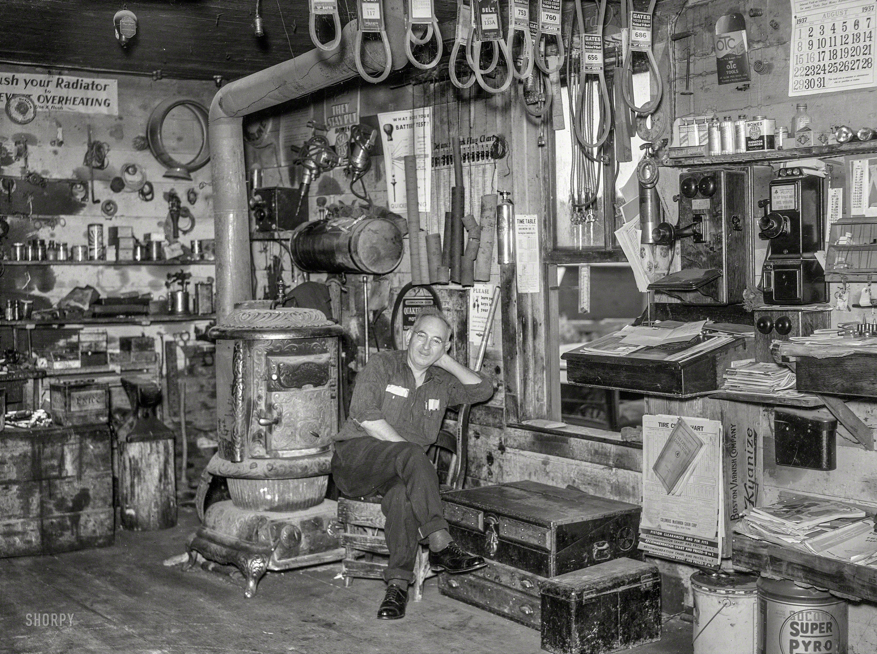 August 1937. "Blacksmith's shop turned into a garage. Cambridge, Vermont." Photo by Arthur Rothstein for the Farm Security Administration. View full size.