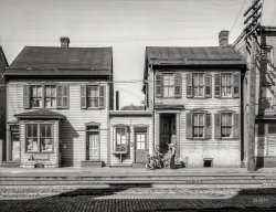 October 1937. "Houses near the railroad tracks. Hagerstown, Maryland." With a return appearance by the boys last seen here. 4x5 inch acetate negative by Arthur Rothstein for the Farm Security Administration. View full size.