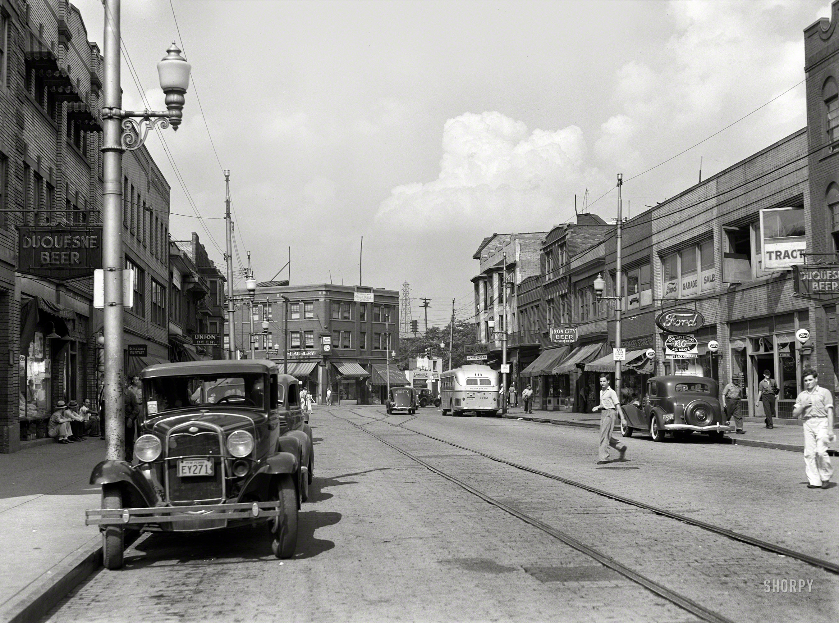 July 1938. "Main street (Franklin Avenue) in Aliquippa, Pennsylvania." Which you don't even have to cross if you're in the mood for a Duquesne. (If you're thirsty for an Iron City or Union Beer, you might have to dodge some traffic.) Photo by Arthur Rothstein for the Farm Security Administration. View full size.