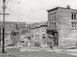 July 1938. "Workers' homes with steel plant along Monongahela River in background. Clairton Duquesne, Pennsylvania." Medium format negative by Arthur Rothstein. View full size.