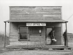 January 1939. "Post office. Colp, Williamson County, Illinois." Medium format acetate negative by Arthur Rothstein for the Farm Security Administration. View full size.
