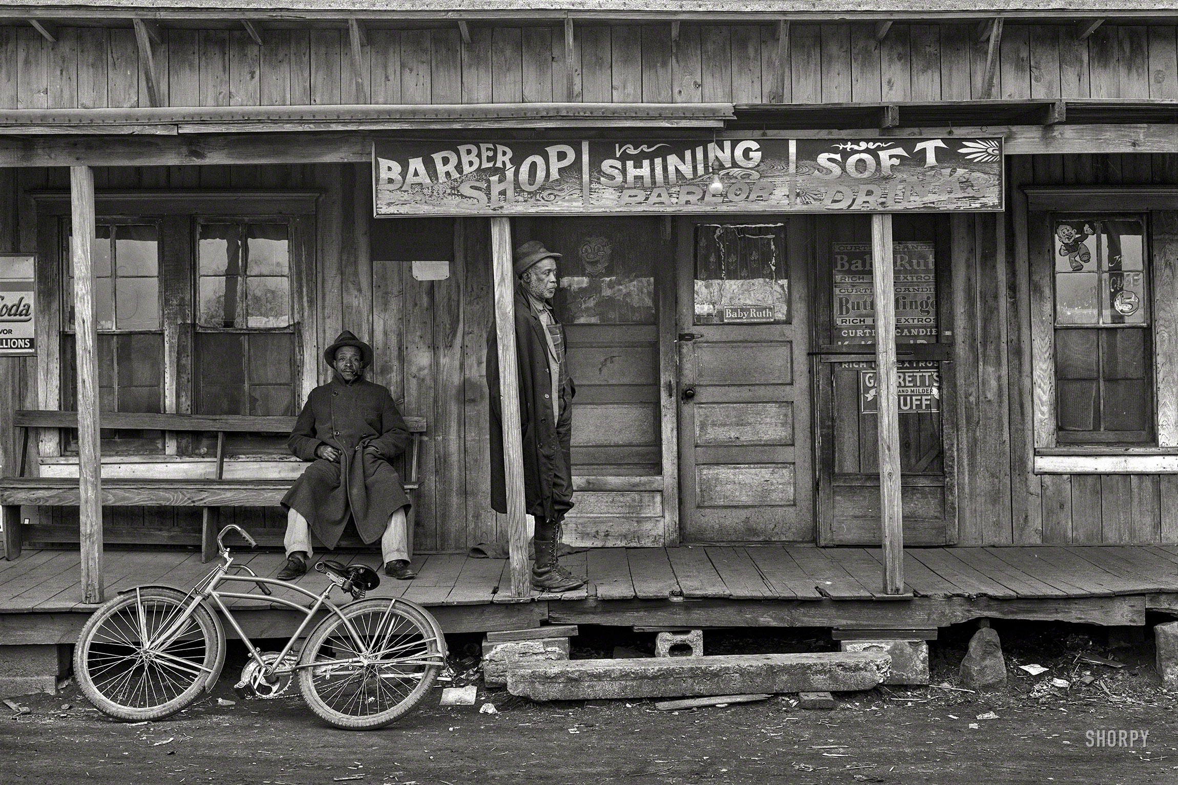 January 1939. "Coal miner in business center of Colp, Illinois." Acetate negative by Arthur Rothstein for the Farm Security Administration. View full size.