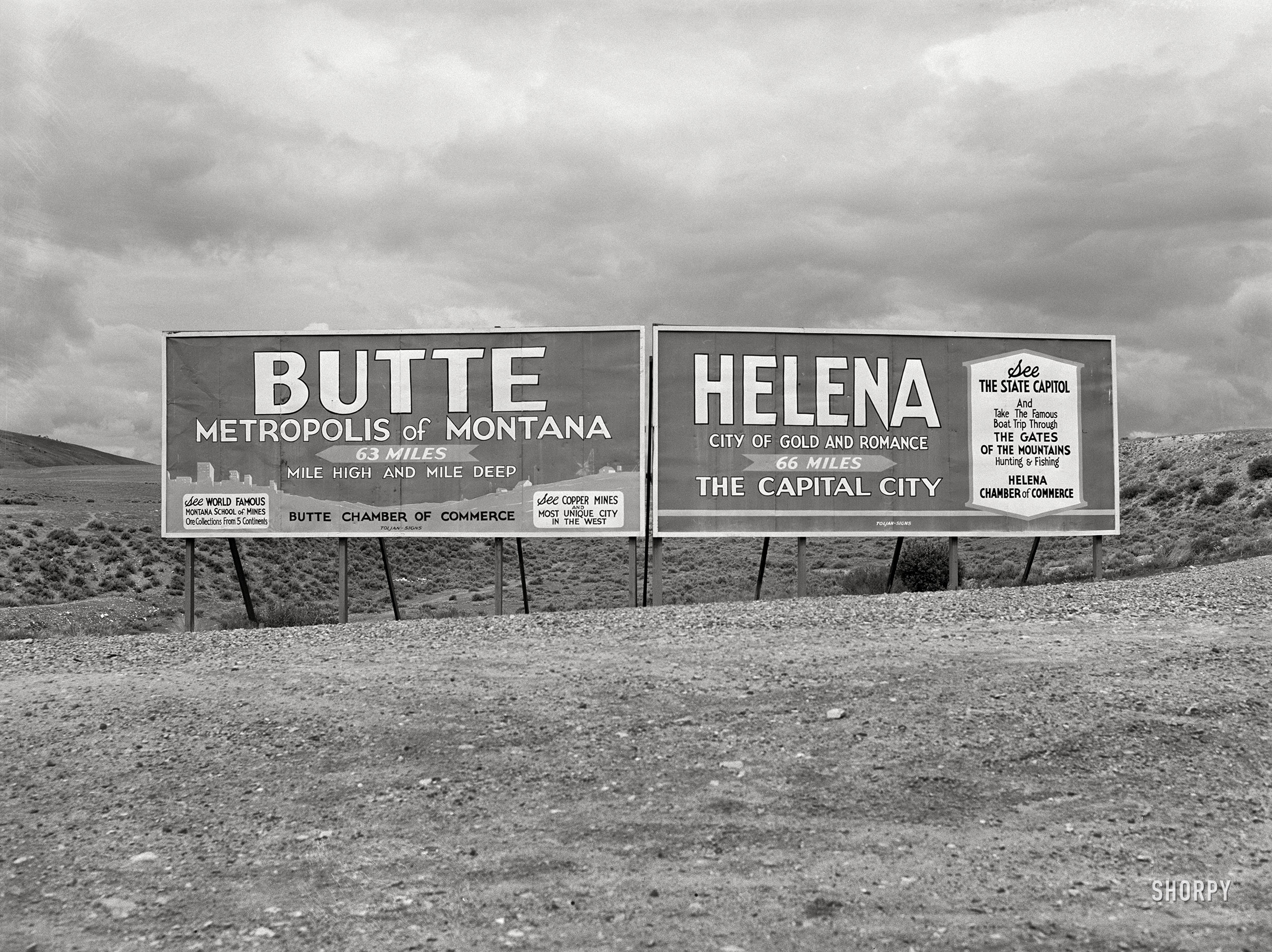 June 1939. "Signs at highway intersection. Three Forks, Montana." Medium format acetate negative by Arthur Rothstein for the Farm Security Administration. View full size.