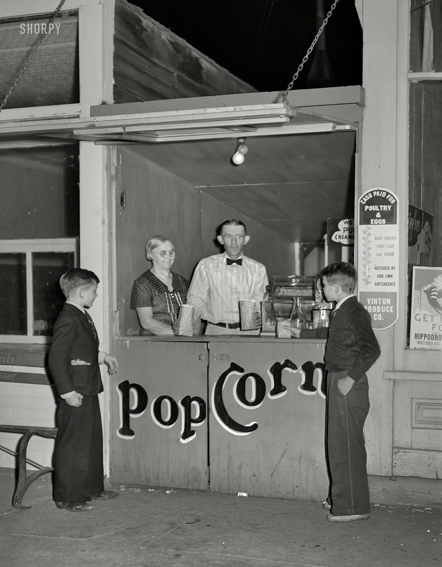 September 1939. "Popcorn stand. Grundy Center, Iowa." Medium format negative by Arthur Rothstein for the Farm Security Administration. View full size.