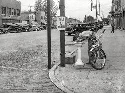 September 1939. "Public drinking fountain in Grundy Center, Iowa." Photo by Arthur Rothstein for the Farm Security Administration. View full size.