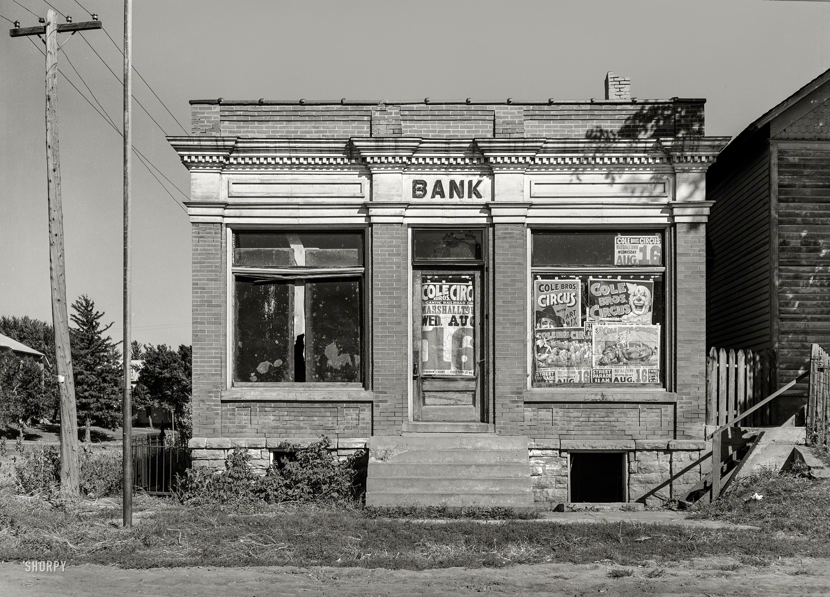 September 1939. "Closed bank. Haverhill, Iowa." Medium format negative by Arthur Rothstein for the Farm Security Administration. View full size.