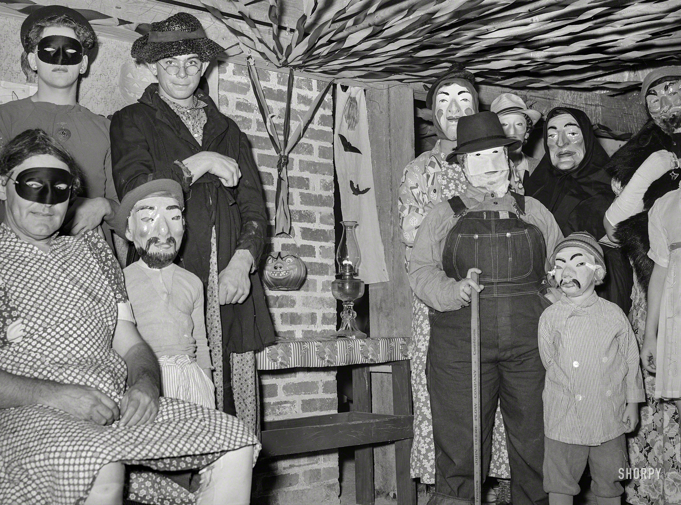 October 1939. "Masquerade at Halloween party. Hillview cooperative, Osage Farms, Missouri." Acetate negative by Arthur Rothstein. View full size.