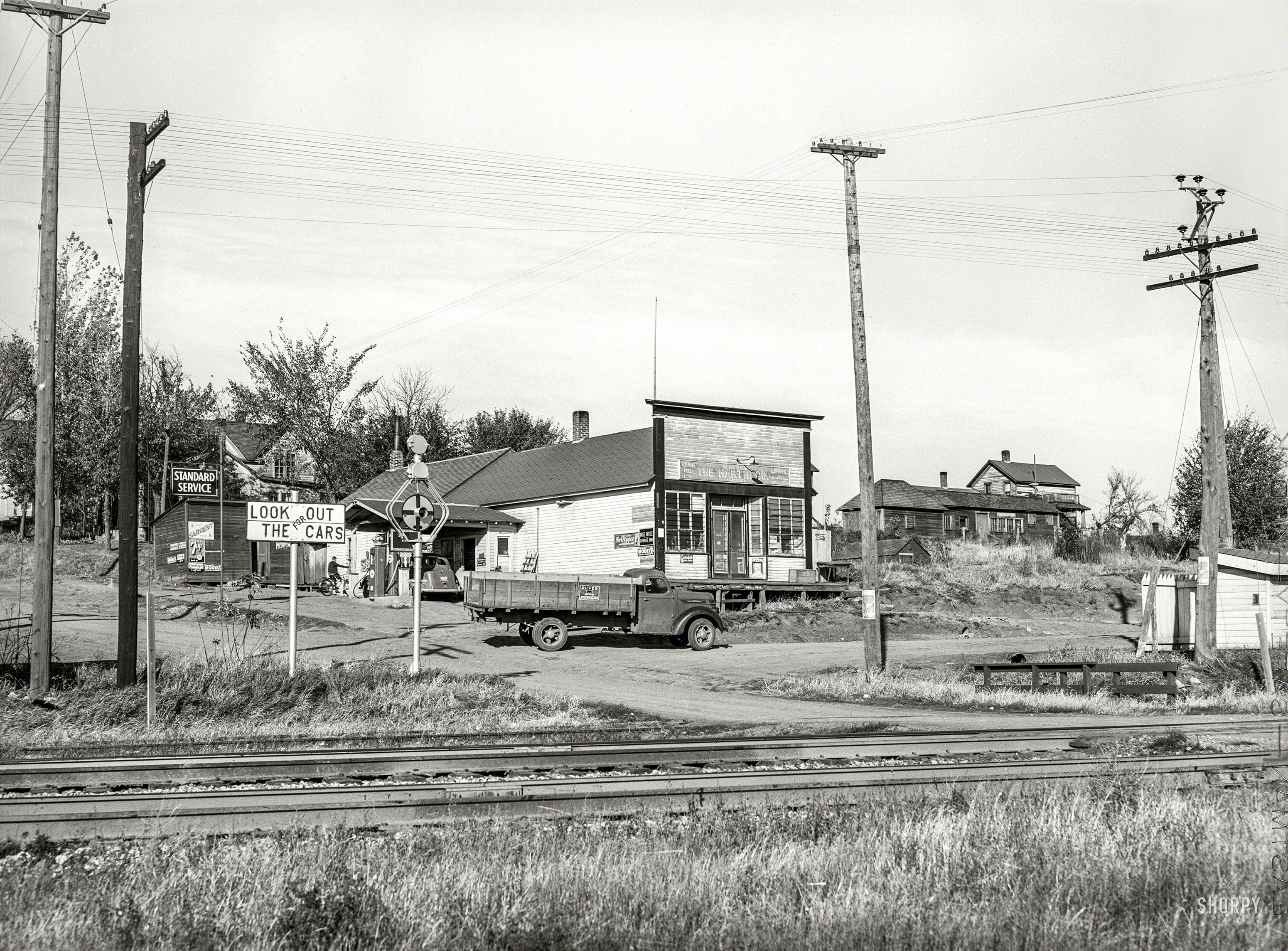 October 1939. "Lamoille, Iowa. A village consisting of a few houses, general store, and railroad station." Medium format acetate negative by Arthur Rothstein for the Farm Security Administration. View full size.