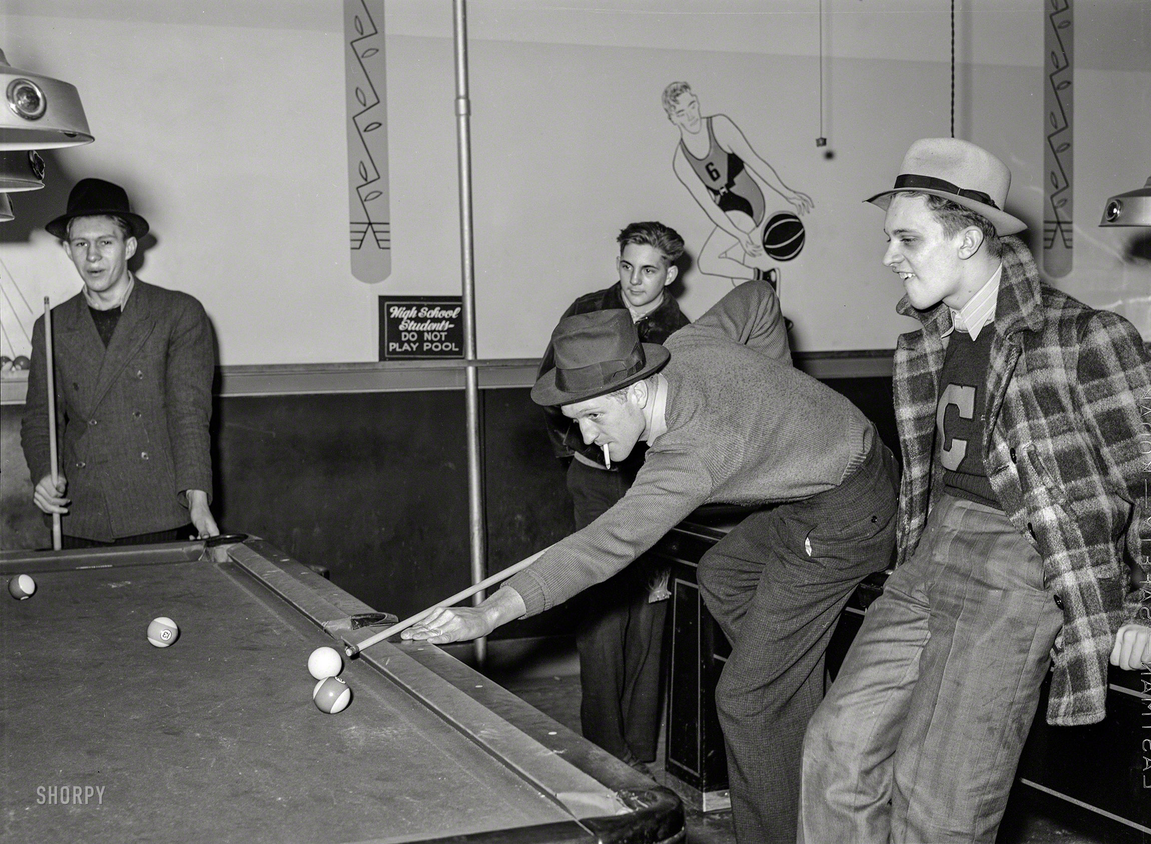 February 1940. "High school students playing pool. Clinton, Indiana." Photo by Arthur Rothstein for the Farm Security Administration. View full size.