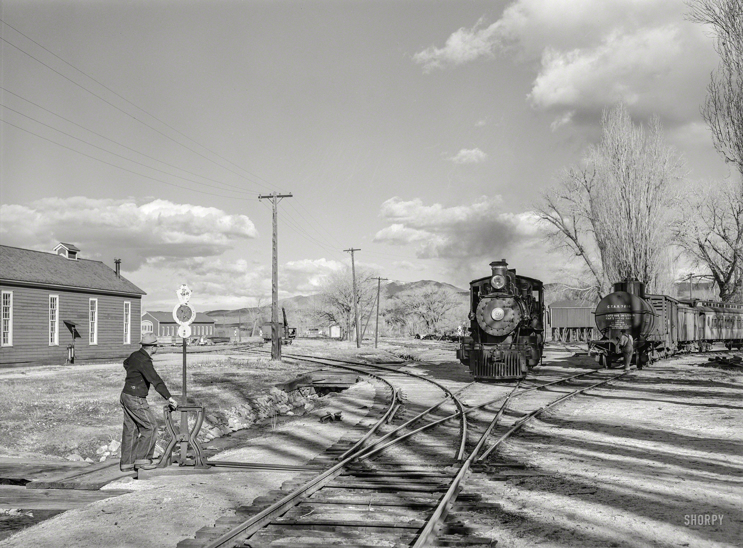 March 1940. "Operating switch at railroad station. Carson City, Nevada." Photo by Arthur Rothstein for the Farm Security Administration. View full size.