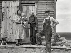 September 1937. "The Herman Gerling family near Wheelock, North Dakota. The daughter lost her arm four years ago." Medium format acetate negative by Russell Lee for the Farm Security Administration. View full size.