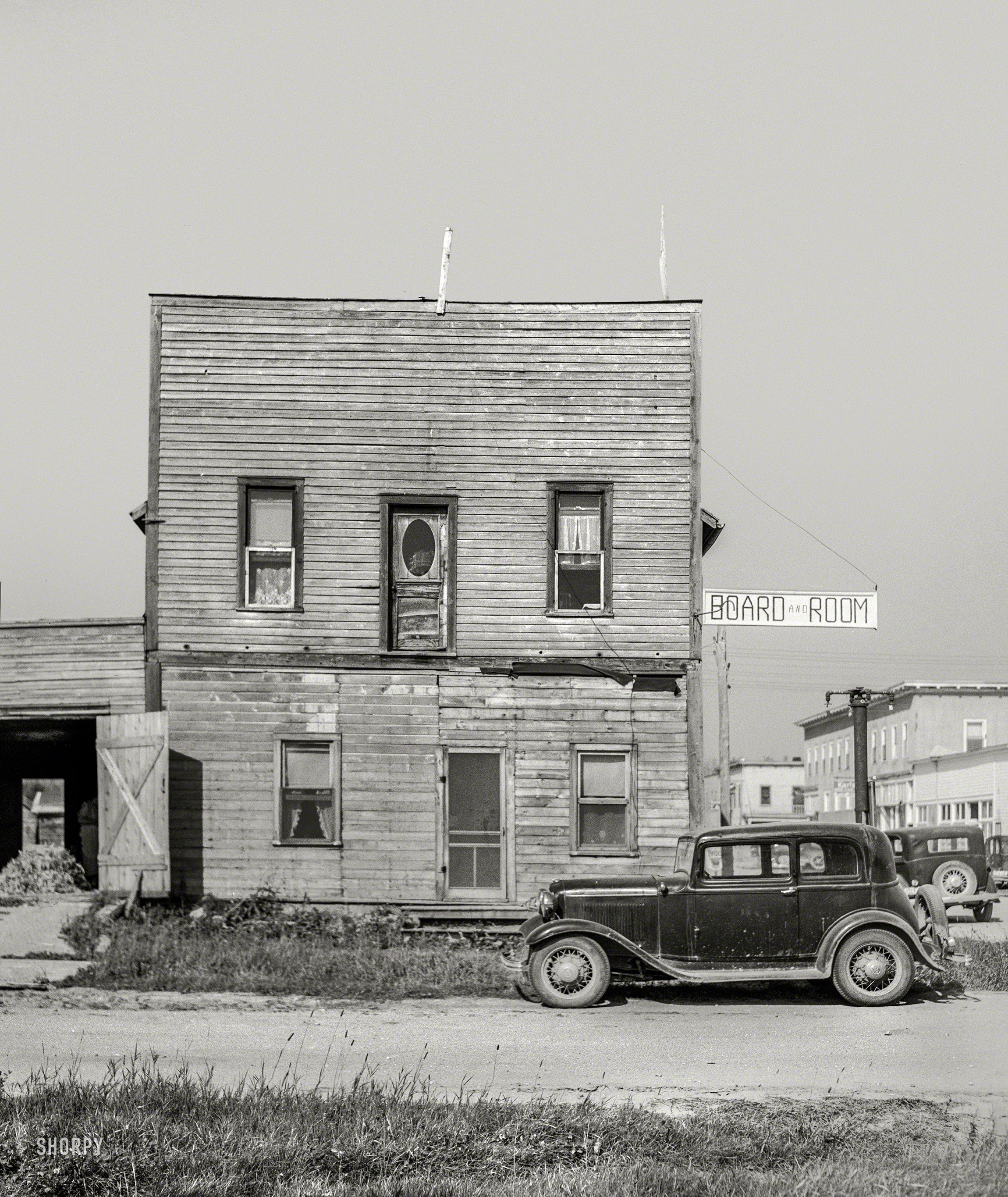 September 1937. "Boardinghouse in Littlefork, Minnesota." Medium format negative by Russell Lee for the Farm Security Administration. View full size.