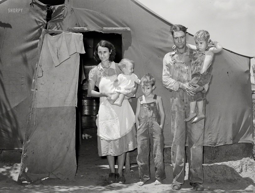 June 1939. "Day laborer and his family who live in the Arkansas River bottoms near Webbers Falls, Oklahoma. This entire family was taking anti-rabic serum after drinking milk from a cow which had rabies. There were no public funds for this treatment and a local man was financing it." Medium format negative by Russell Lee for the Farm Security Administration. View full size.
