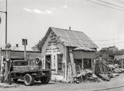 July 1939. "Automobile salvage business in Muskogee, Oklahoma." Medium format acetate negative by Russell Lee for the Farm Security Administration. View full size.
