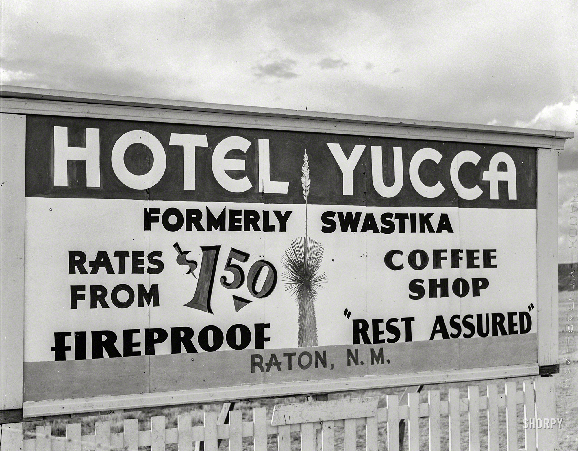 September 1939. "Sign along the road near Capulin, New Mexico." Photo by Russell Lee for the Farm Security Administration. View full size.