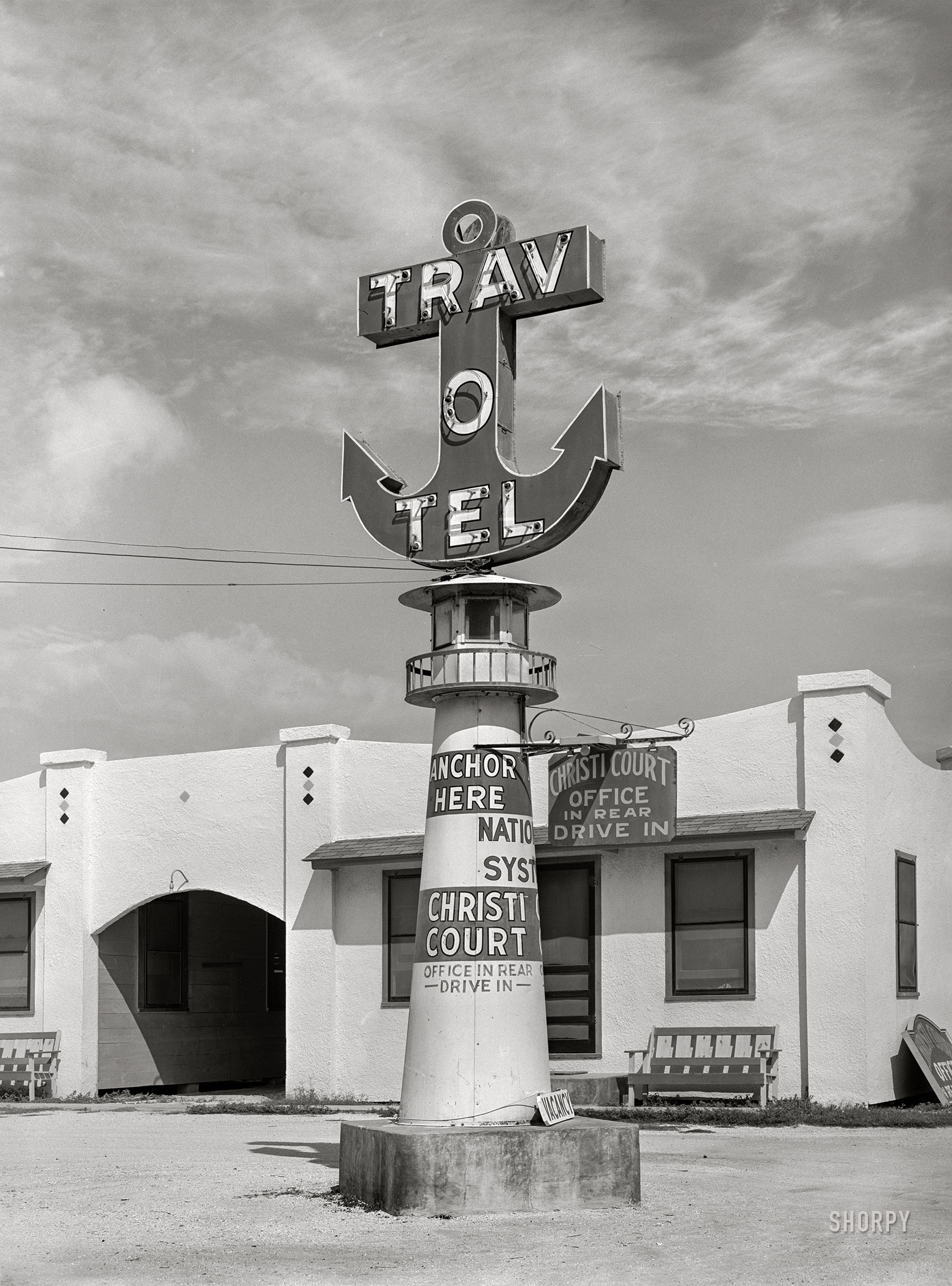 October 1939. "Insignia of nationally affiliated tourist courts. Corpus Christi, Texas." Medium format acetate negative by Russell Lee for the Resettlement Administration. View full size.