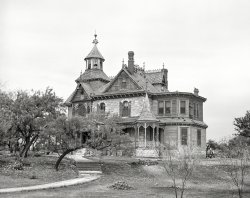November 1939. "Old mansion in Comanche, Texas." Our second look at the pigeon roost otherwise known as Oakland Heights, last seen here. Photo by Russell Lee for the Farm Security Administration. View full size.
Yuck!The open window of that turret room probably has resulted in a massive pigeon-dropping mess.
Bird houseHas anyone cracked that house is for the birds? 
But seriously, it's a fascinating house and I would like to know more about it -- when was it built and where can it be found on Google Maps? Comanche is a very small town but I can't find it.
[Possibly because it no longer exists. - Dave]
You can&#039;t get there from hereYou can't find this house because it was torn down in the 1950s. Oakland Heights stood on the western half of the block bounded by North Austin Street, West Neely Avenue, North Houston Street, and West Walcott Avenue. The modern-day address would be 107 West Walcott.
It was built shortly after 1887 by Dexter Walcott, for whom the street was named. Unfortunately, he didn't get to enjoy it much; he died suddenly and his widow had to superintend completion.
Much of the foundation is still there. If you look at the street view on Googlemaps, you can make out what I believe to be the right side foundation still there including the stairway going up on the side of the gazebo looking porch. Fascinating. 
(Thank you Marchbanks for the address info). 
Its replacementIs somewhat impressive in its own right.  I looked on Google Maps and found the lot as described by Marchbanks.  The sign out front says it's 105 West Walcott, and it's a shingle-sided, split level ranch, T-shaped in plan view.  On the east side of the lot is what appears to be stonework from Oakland Heights' original foundation walls, backfilled with dirt and covered with grass, creating a terraced yard.  Yeah, I'd live there.

Has a Mr. Hitchcock lived nearby?I can see where some ideas came from.
(The Gallery, Russell Lee)