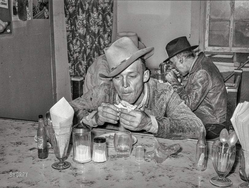 November 1939. "West Texan at eating house at auction. Stockyards, San Angelo, Texas." Photo by Russell Lee for the Farm Security Admin. View full size.

