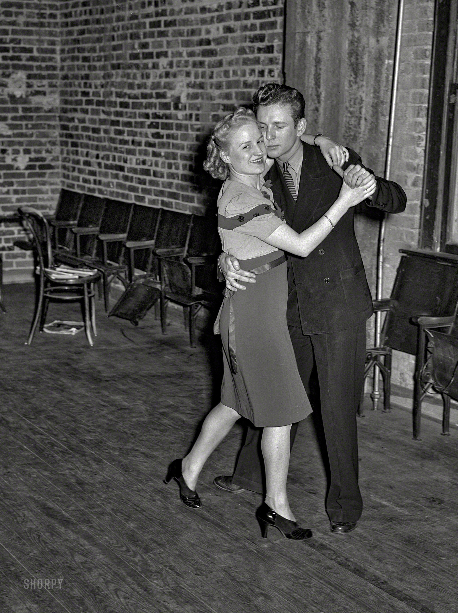 February 1940. "Young couple dancing at Jaycee buffet supper and party. Eufaula, Oklahoma." Photo by Russell Lee for the Farm Security Admin. View full size.
