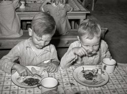 May 1940. "Boys eating their lunch at the WPA nursery school at Casa Grande Valley Farms. Pinal County, Arizona." Photo by Russell Lee, Farm Security Administration. View full size.