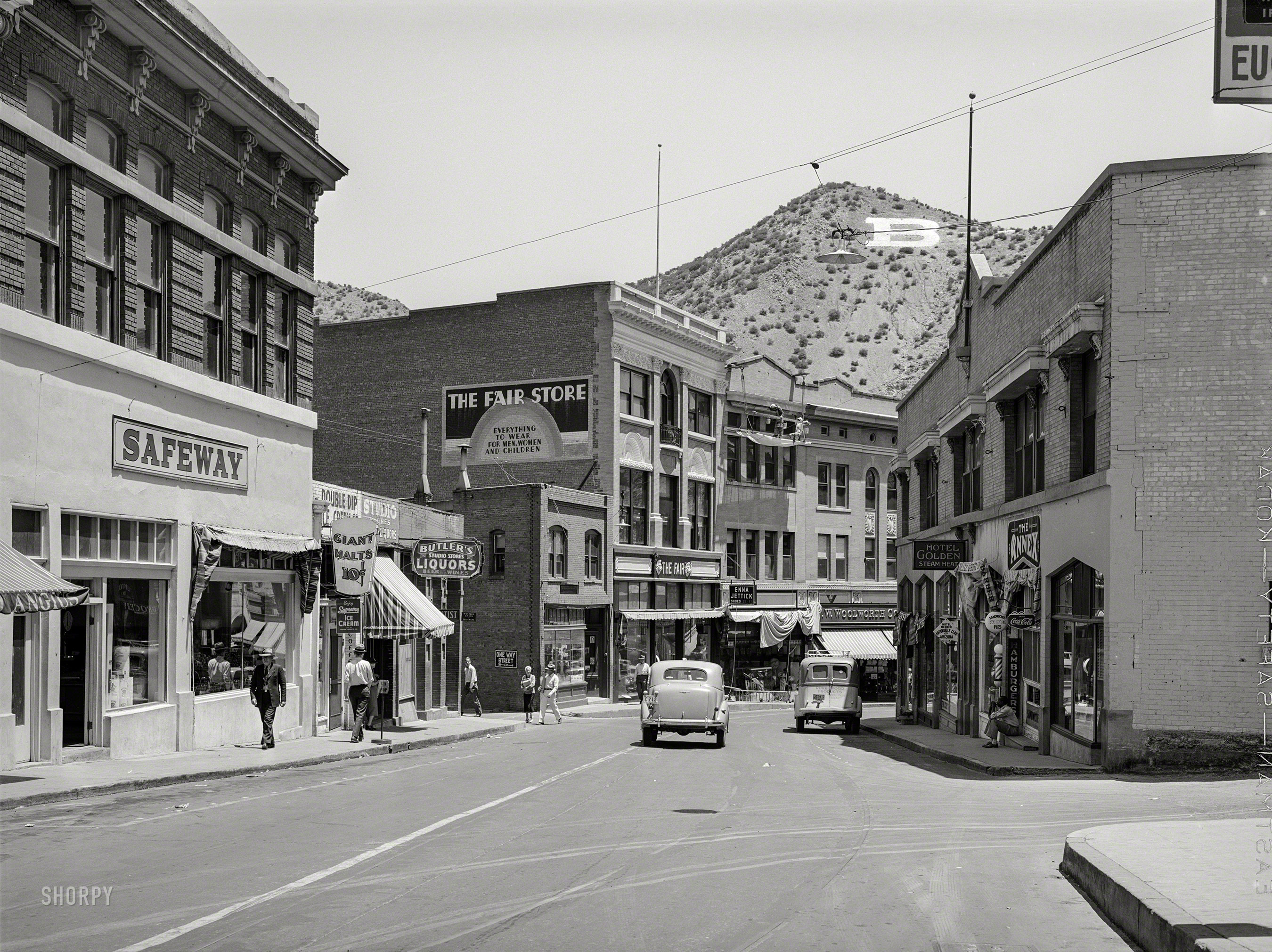 &nbsp; &nbsp; &nbsp; &nbsp; If anyone needs us, we'll be at our table at Cafe Roka. Just as soon as those painters get done. And the 1990s roll around.
May 1940. "Main street of Bisbee, Arizona. Copper mining center." Medium format negative by Russell Lee for the Farm Security Administration. View full size.