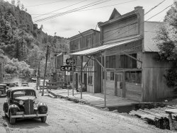 May 1940. "On the main street of Mogollon, New Mexico." Medium format negative by Russell Lee for the Farm Security Administration. View full size.