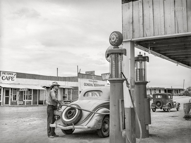 June 1940. "The gasoline pumps at Pie Town, New Mexico." Medium format acetate negative by Russell Lee for the Farm Security Administration. View full size.
