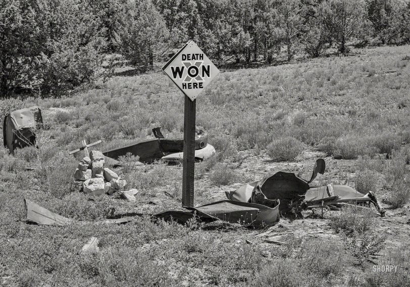 July 1940. "Marker of accident on the highway in Bernalillo County, New Mexico." Photo by Russell Lee for the Farm Security Administration. View full size.

