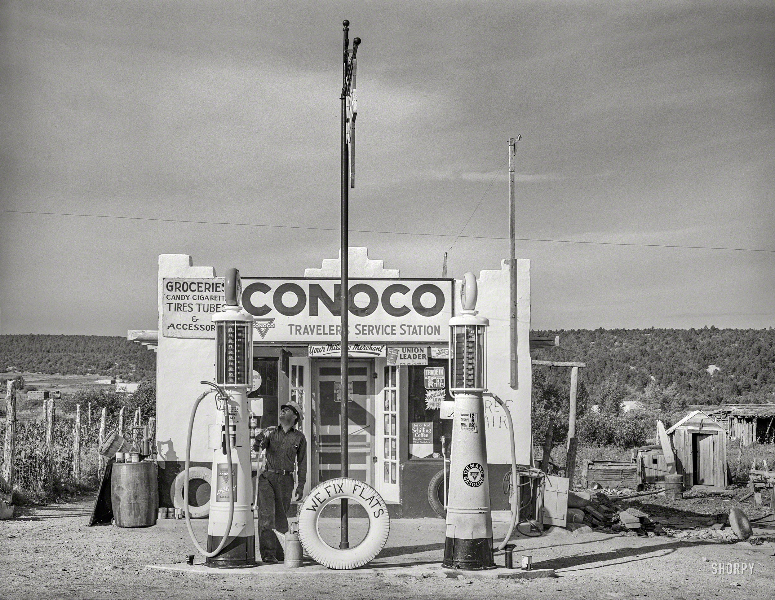 July 1940. "Filling station is only building of modern design in the Spanish-American village of Penasco, New Mexico." Medium format acetate negative by Russell Lee for the Farm Security Administration. View full size.