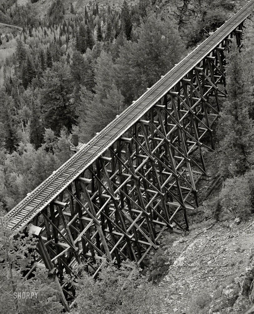 September 1940. "Trestle of narrow gauge railroad near Ophir, Colorado." Acetate negative by Russell Lee for the Farm Security Administration. View full size.
