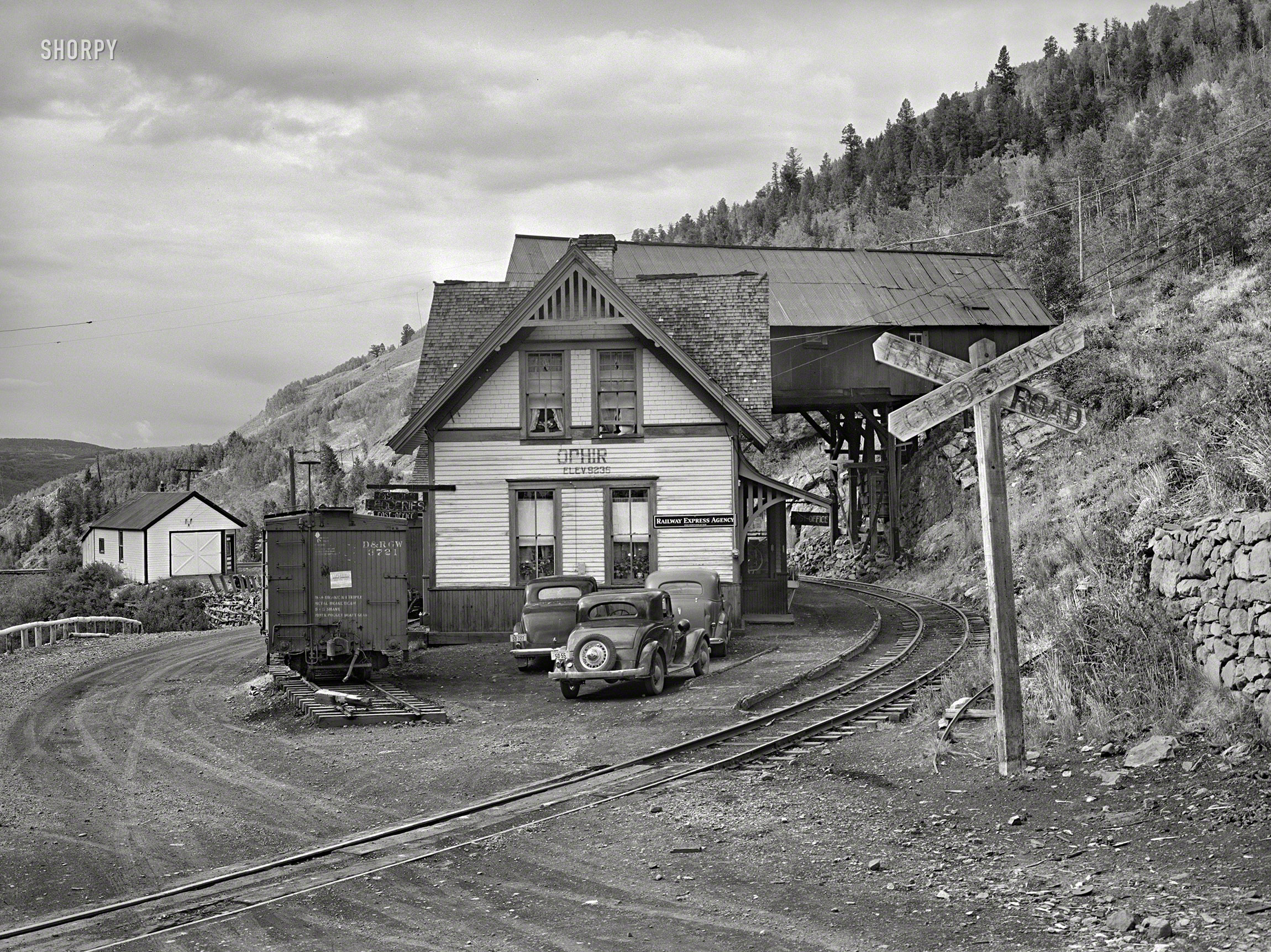 September 1940. "Railway station at Ophir, Colorado, a small gold mining town. A narrow-gauge railway runs into the town with supplies and takes out the ore." Photo by Russell Lee for the Farm Security Administration. View full size.