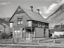 September 1940. "Old house in Silverton, Colorado. This was the type of house built by mine and mill operators in the early mining days and indicates that the owners felt that the mining operations would be of a permanent nature." Acetate negative by Russell Lee for the Farm Security Administration. View full size.