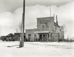 April 1936. "Grocery store in Widtsoe, Utah. FSA land use project purchase area and clients who will be removed to more desirable section." Medium format negative by Dorothea Lange for the Resettlement Administration. View full size.