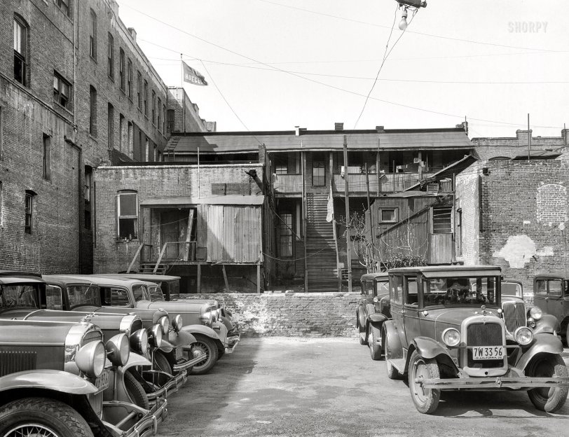 February 1936. "Mexican quarter of Los Angeles, California. Houses condemned to make space for the new Union Station. Average rental eight dollars. Some houses have plumbing." 4x5 nitrate negative by Dorothea Lange for the Resettlement Administration. View full size.
